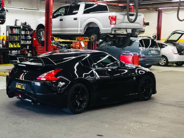 Black Nissan at A+ Japanese Auto Repair Shop in San Carlos